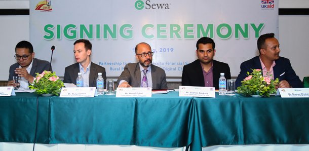 डिजिटल माध्यमबाट ग्रामीण भेगमा वित्तीय सेवामा पहुँच पुर्याउन इसेवा र युके एड सक्षमबीच हस्ताक्षर