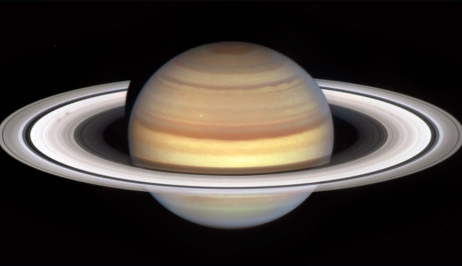 नासा टेलिस्कोप हबलले खिच्यो शनिको बाहिरी घेरामा कुदिरहेका रहस्यमय ‘स्पोक्स’